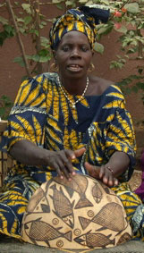 Calabash player - Photo by Elisabeth den Otter